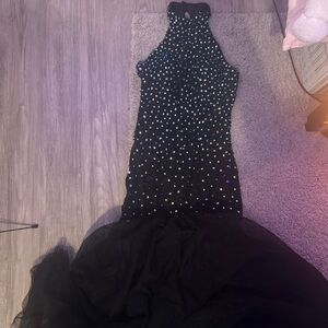 Elegant Black dress with Sparkling Accents and a poof skirt